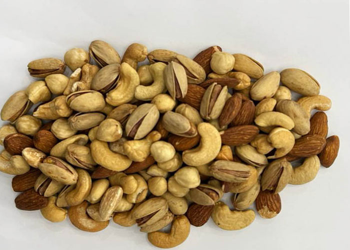 چگونه نم آجیل را بگیریم؟ روش های سنتی و صنعتی برای حفظ طعم و کیفیت خشکبار